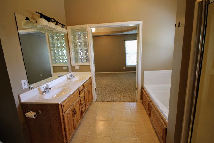 Owner's Suite Bathroom to Bedroom, Top Floor - 9505 NW 86th Ter