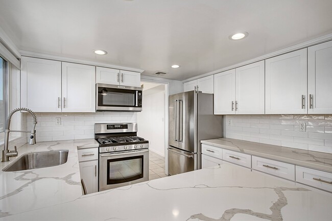 Updated Kitchen facing Dining Room - 5325 Lindley Ave