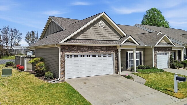 Building Photo - Experience refined, low-maintenance living in this beautifully appointed end-unit townhome