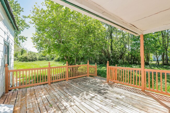 Building Photo - Charming 4-Bedroom Home with Hardwood Floo...