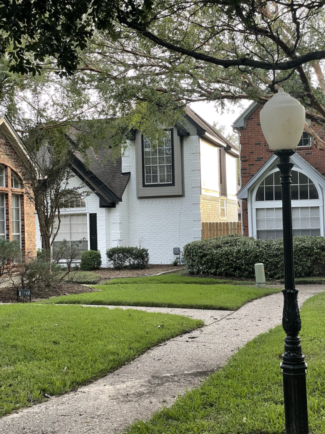 Side walk view of QueensClub - 6633 Queensclub Dr