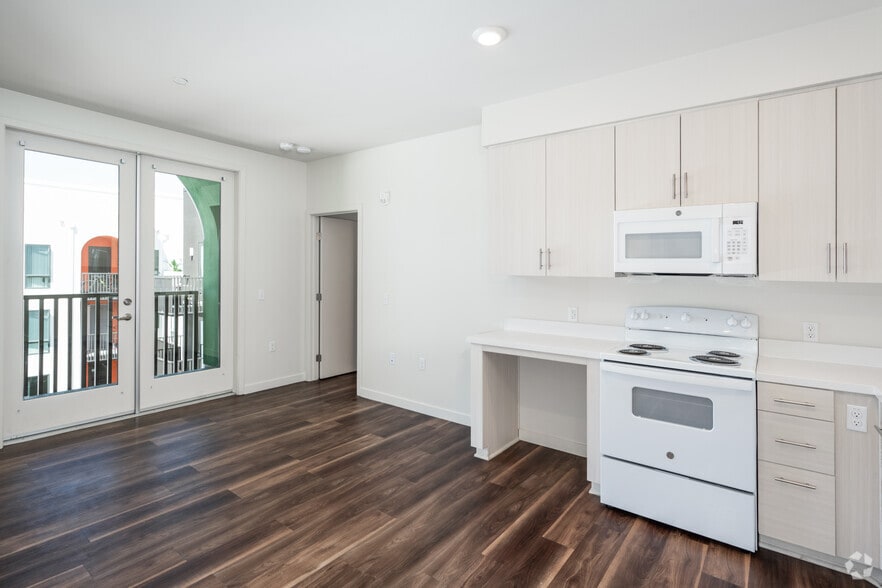3BR, 2BA - 905SF - Kitchen and Living Room - Archways Santa Ana