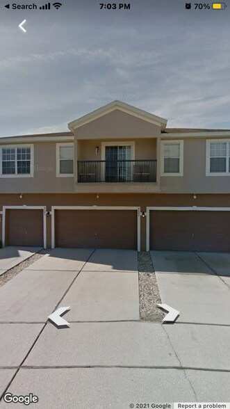 Front view with 1 car garage - 4045 Pemberly Pines Cir