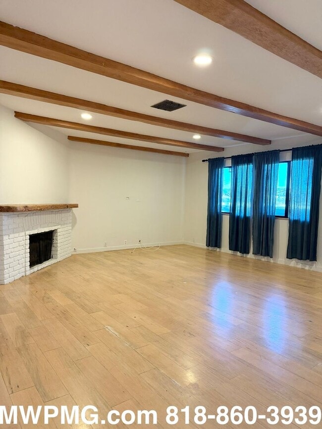 Building Photo - 4Bed 3Bath Woodland Hills home is an absol...