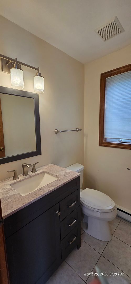 Building Photo - Bright & Spacious 2BR Townhome w/ Finished Basement, Deck & Parking