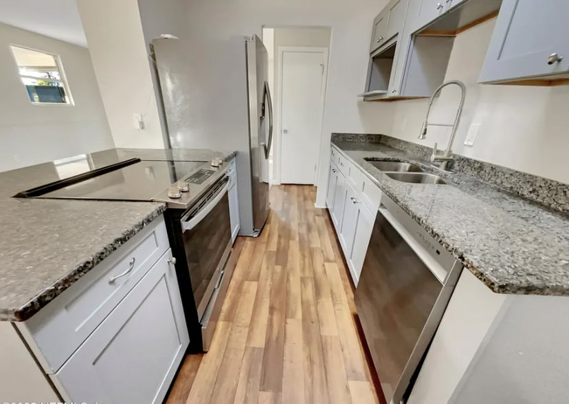 Building Photo - 7748 Knoll Dr N