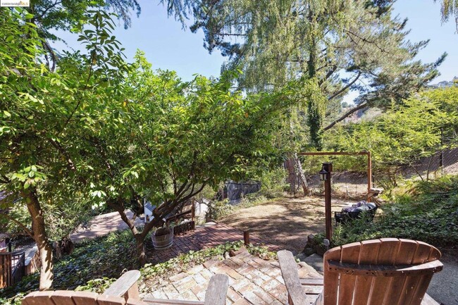 Building Photo - 4-Bedroom Gem with Forest Views and Separa...