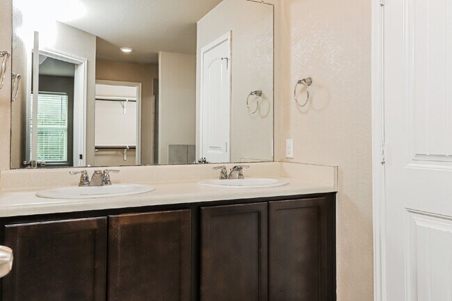 Building Photo - "Charming 4-Bed Sanctuary on Live Oak Pass with Modern Granite Finishes!"