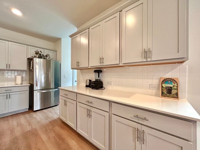 Building Photo - Light-Filled 4 Bedroom, 2 Bath Home with Deck & Fenced Backyard