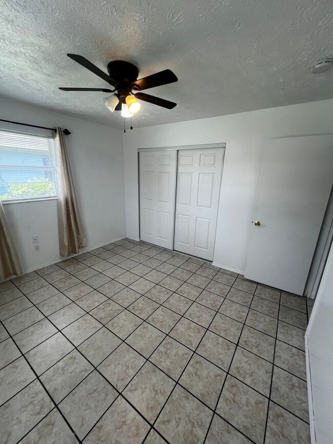 Building Photo - 3 BEDROOM 2 BATH CONVENIENTLY LOCATED WITH A TROPICAL OASIS IN THE BACK YARD!