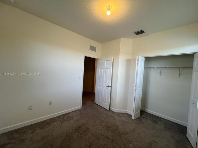 Building Photo - 11066 W 33rd Ln