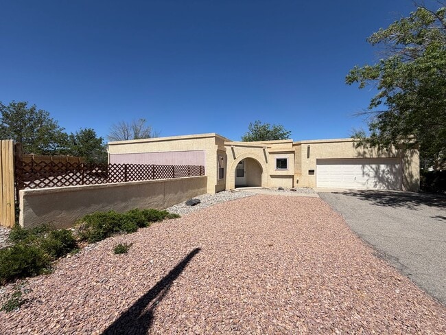 Building Photo - 2 Bedroom Single Story Home Available Near Unser Blvd NE & Northern Blvd NE in North Hills Rio Ra...