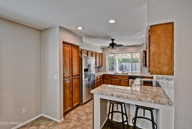 Building Photo - 6747 E Aire Libre Ln