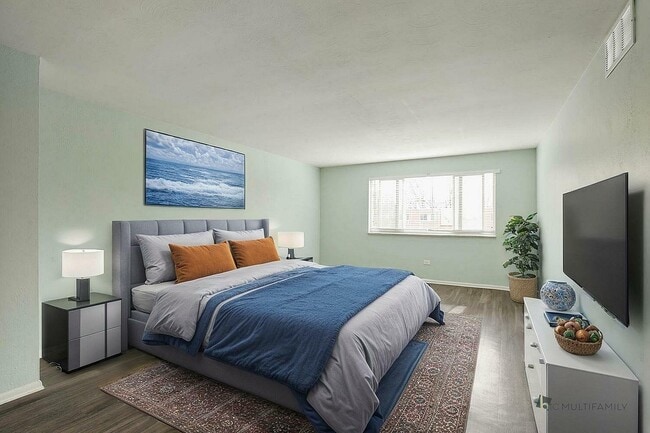 Inviting bedroom with a plush queen-sized bed, elegant decor, and peaceful ocean-themed artwork, bathed in natural light. - LaRonja Apartments