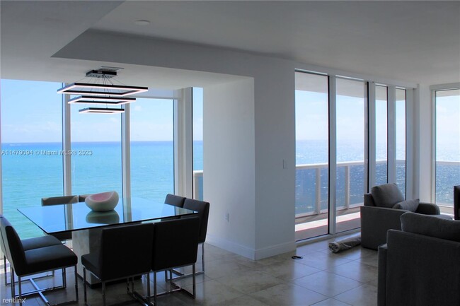 Building Photo - 2 br, 2.5 bath Condo - 10275 Collins Ave A...