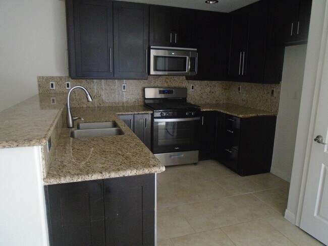 Building Photo - MOVE IN SPECIAL $3397.50 MOVES YOU IN!