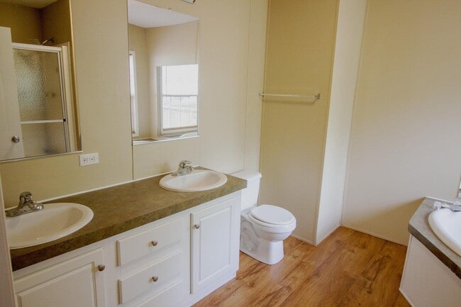 Building Photo - 9289 E River Dr