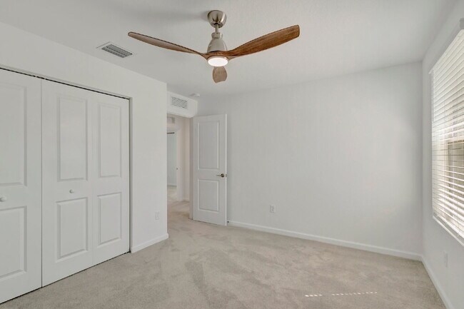 Building Photo - Luxurious Living: Spacious 5-Bedroom Home with Scenic Views in Port Saint Lucie!