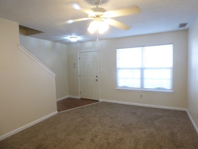 Building Photo - COMING SOON! Spacious Townhouse, W/D Hookups, Off-Street Parking, All Electric!