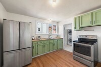 Building Photo - 1/2 Month Free! Storybook Farmhouse - Updated Kitchen, A/C, Basement, Fenced Yard, Garage, Laundr...