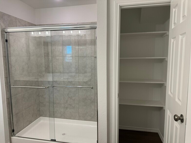Master Bathroom - linen closet - 16113 Isles Dr