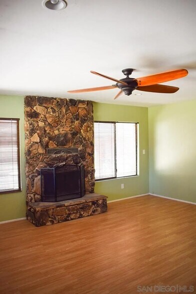 LIving room fire place - 7627 Pine Blvd
