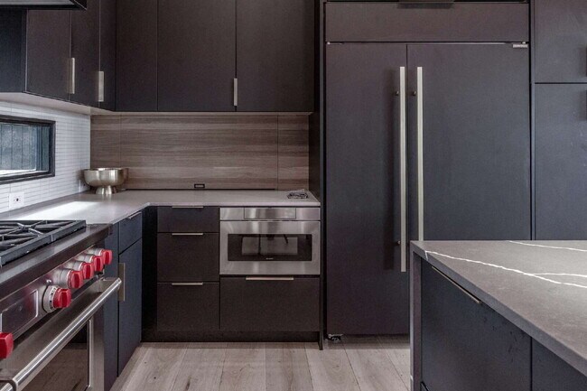 Building Photo - Modern Luxury Rental with Unobstructed Fla...