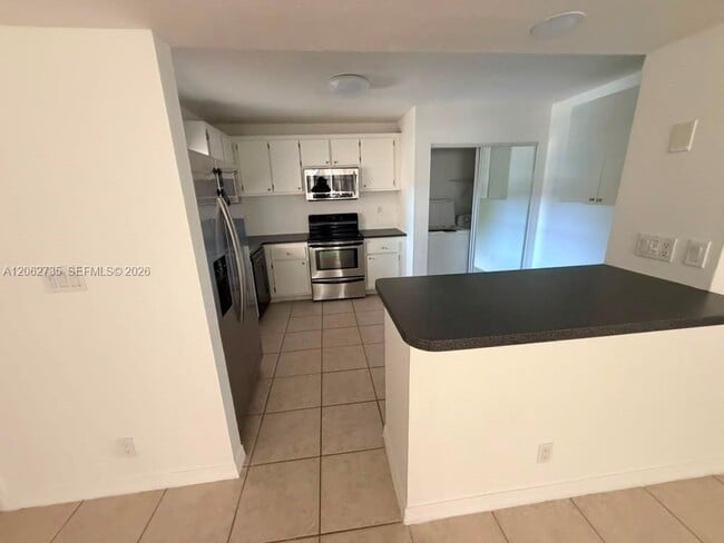 Building Photo - 12193 Royal Palm Blvd