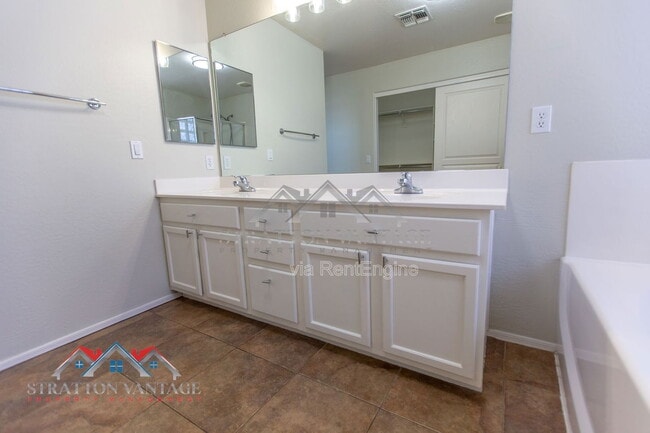 Building Photo - 14099 W Riviera Dr