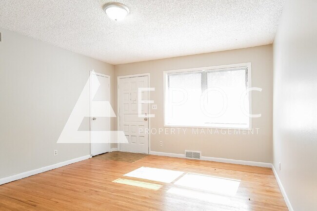 Building Photo - 1933 W 49th Pl