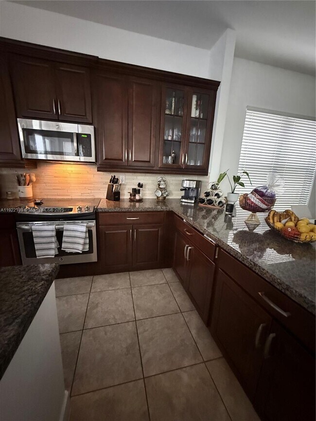 Building Photo - 9823 W 34th Ln