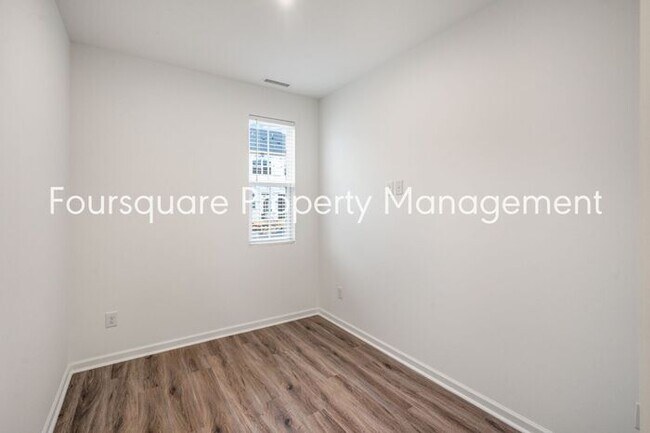 Building Photo - Spacious 3-Bed / 2.5-Bath Townhome with First-Floor Den, Hardwood Floors & 1-Car Garage – Wendell...