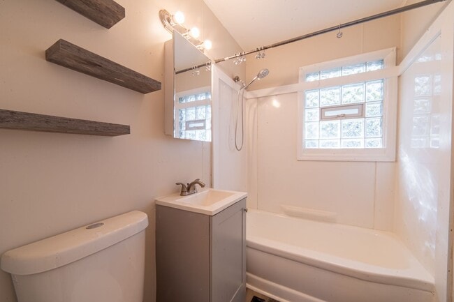 Building Photo - 4-Bedroom Home with Garage, Gated Yard & Sunroom