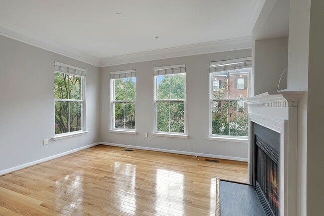 Building Photo - COMING SOON - Great 4 level end unit TH in...