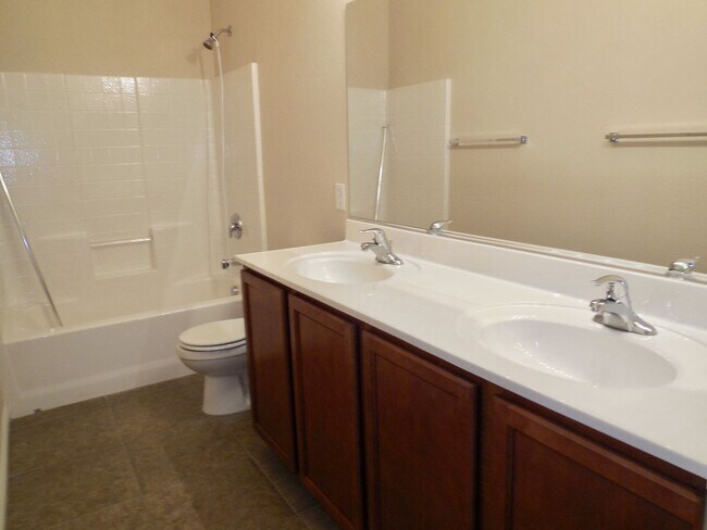 Building Photo - Spacious House w/Tons of Storage,Tile & Wo...