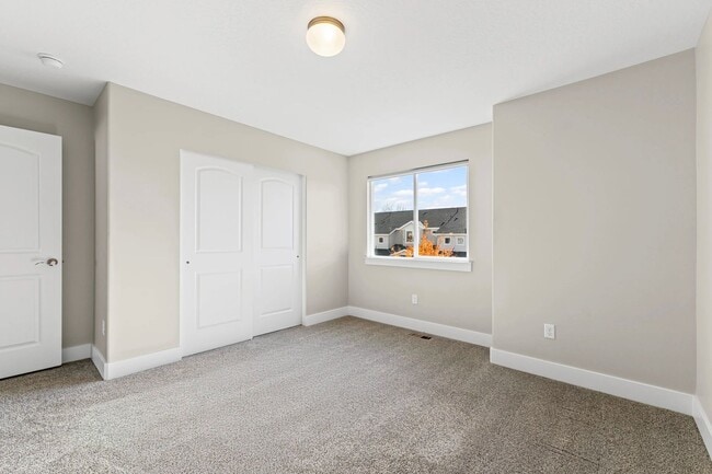 Building Photo - Upgraded 4-Bed Townhome with Finished Base...