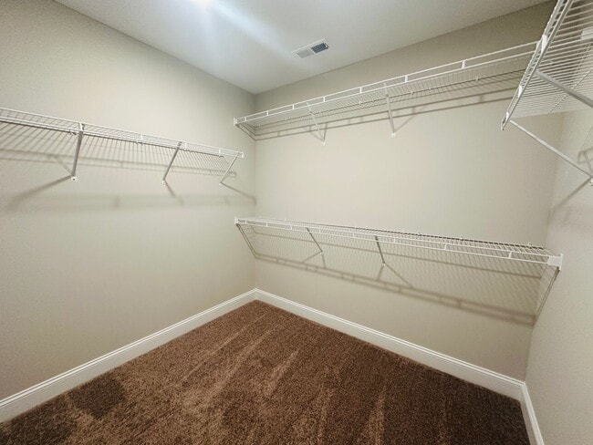 Building Photo - Beautiful Like-New 3 bed/2.5 bath w/ 2-car garage & fenced in backyard available June 24th!