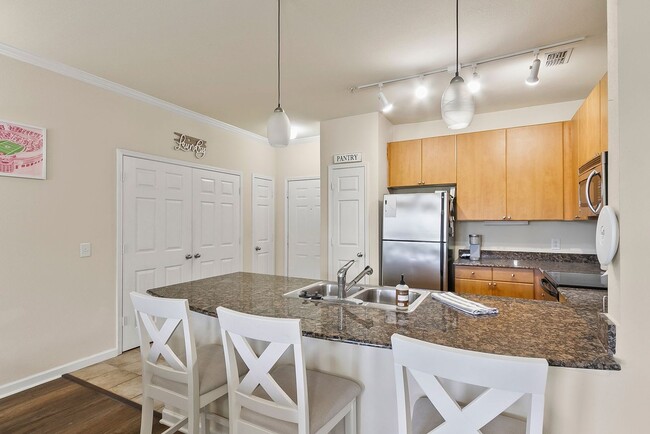 Building Photo - Midtown Village 2 Bed 2 Bath Condo! Available July!