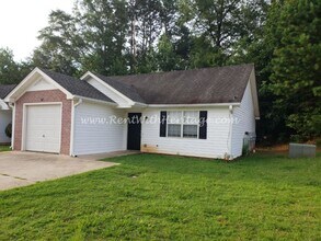 Building Photo - GREAT ONE LEVEL TOWNHOME / END UNIT / POPULAR DOWNTOWN VILLA RICA AREA / CAN WALK TO SHOPPING AND...