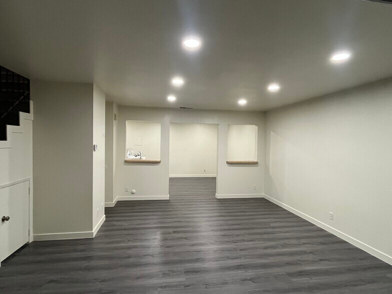 Living Room Looking Into Dining. Dimmable resessed lights - 1103 W Francis St