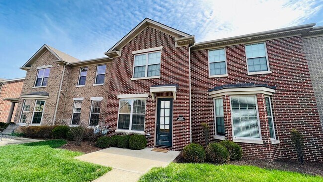 Building Photo - 4 bedroom 2.5 bathroom townhome located in Beaumont Park Townhome