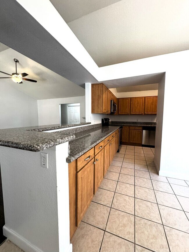 Building Photo - 3 BEDROOM WITH FIREPLACE AND LVP PLANK FLO...