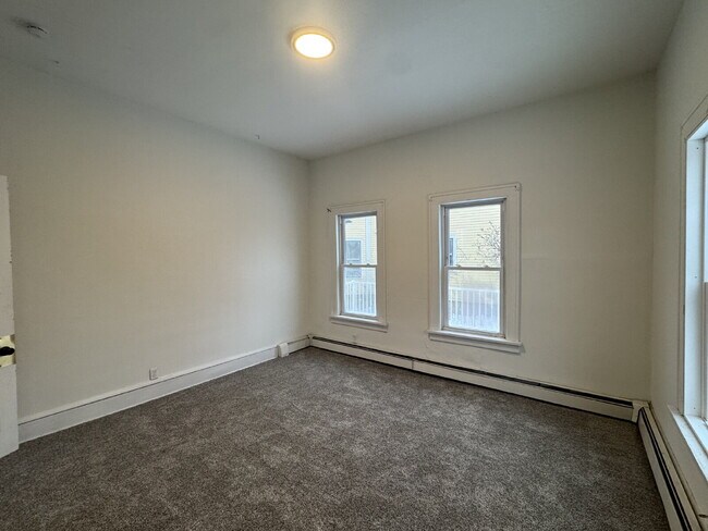Building Photo - "Spacious 3-Bedroom Minneapolis Gem with Gleaming Hardwood Floors & 2 Full Baths!"