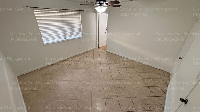 Building Photo - 3 bedroom 2 bathroom home on a corner lot with extra fenced parking.