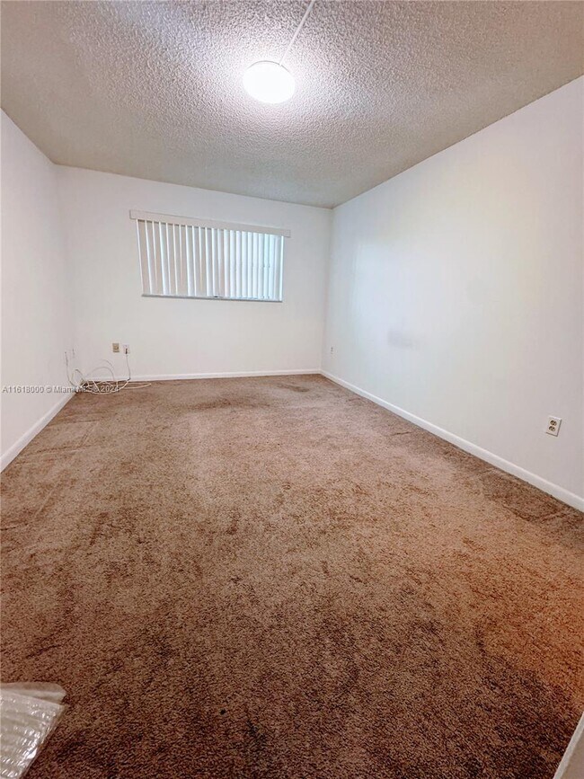 Building Photo - 8100 Sunrise Lakes Blvd