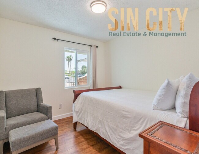 Building Photo - "Charming 4-Bedroom Retreat in Las Vegas –...