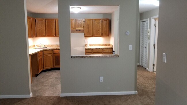 Building Photo - First floor, garden style condominium