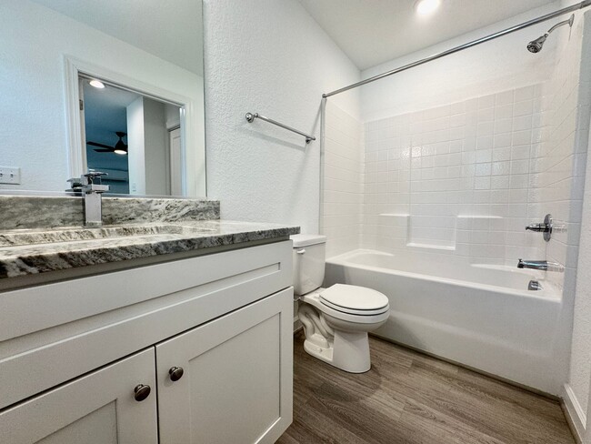 Building Photo - Practically New & Available May 1st! Luxur...