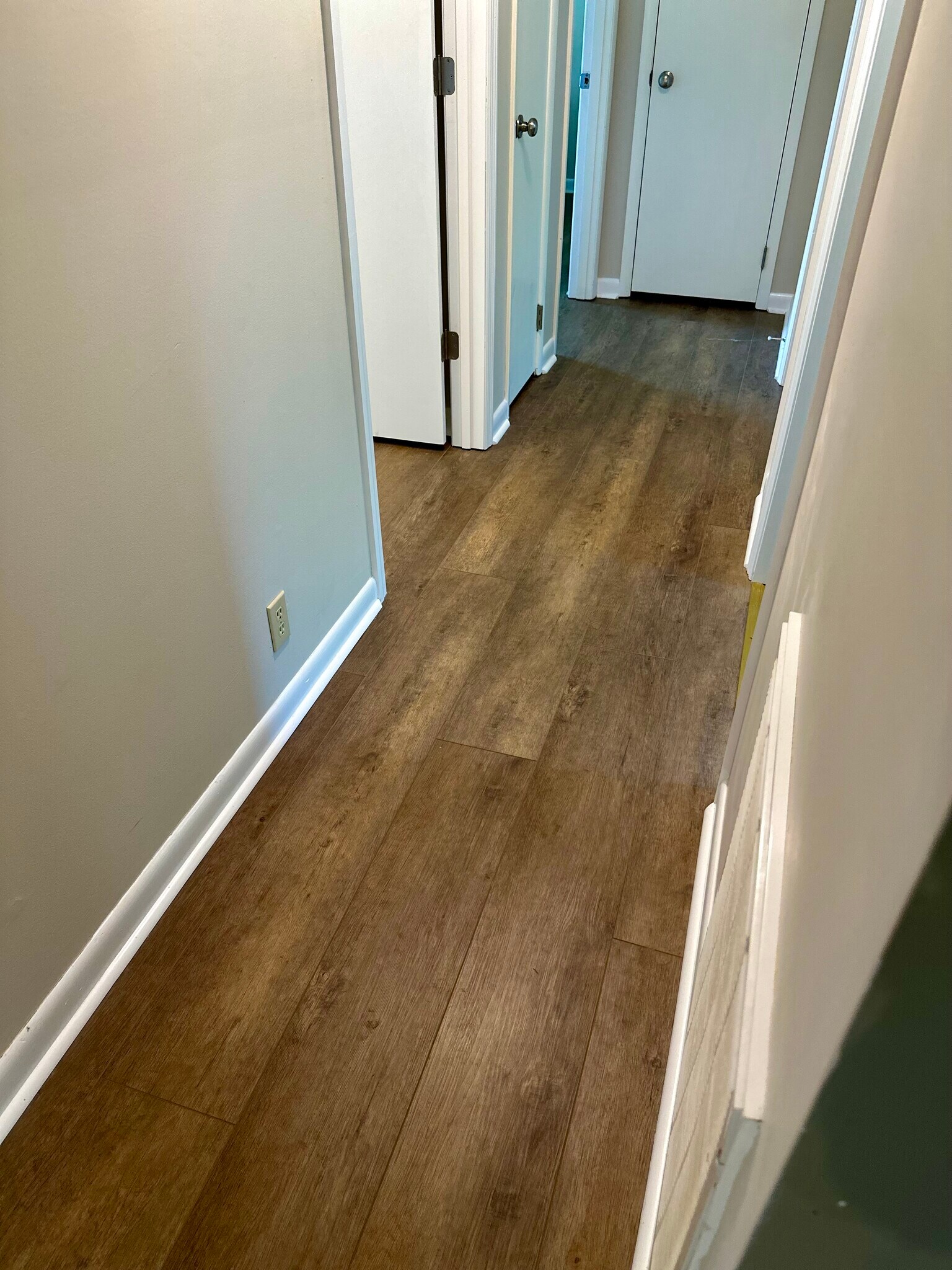 New LVP flooring in living room, hallway, and all bedrooms. - 9 Garden Ln