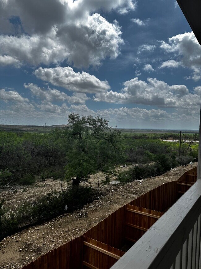 Building Photo - "Charming 3-Bedroom Duplex in San Antonio with Granite Elegance!"